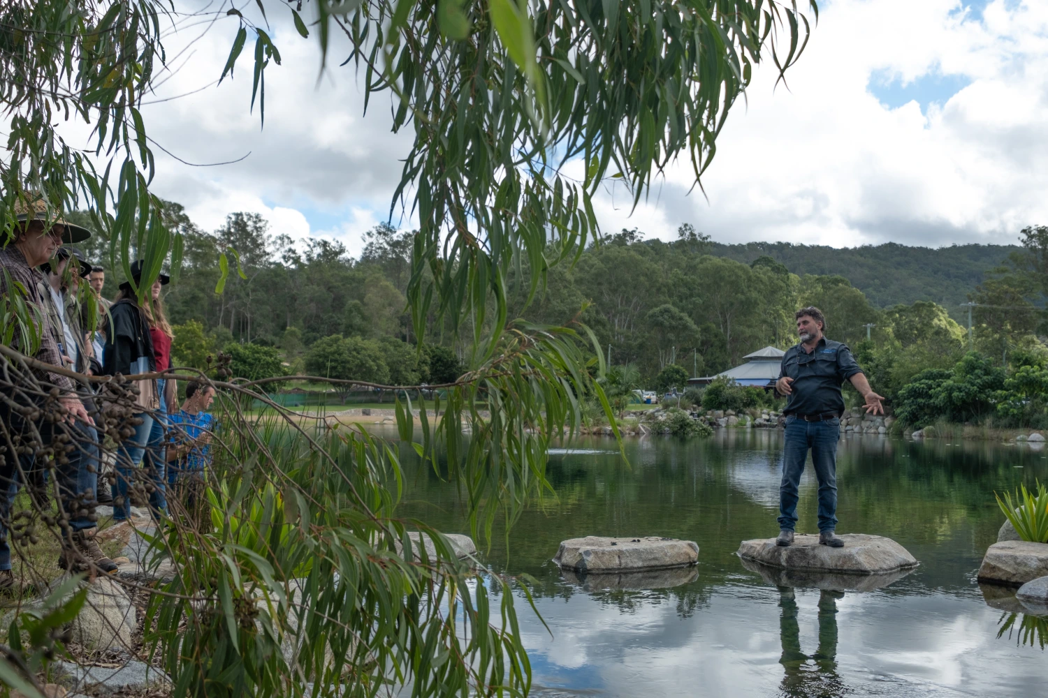 A man showing environmental landscaping